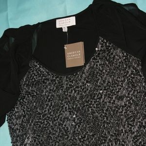 SHEAR SLEEVED TOP